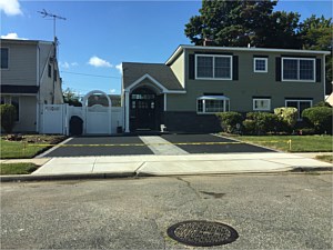blacktop asphalt driveway walkway in center granite city onyx nicolock cambridge stone ridge ledgestone random